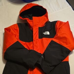 The North Face Bold Red and Black Hooded DRYVENT Jacket.